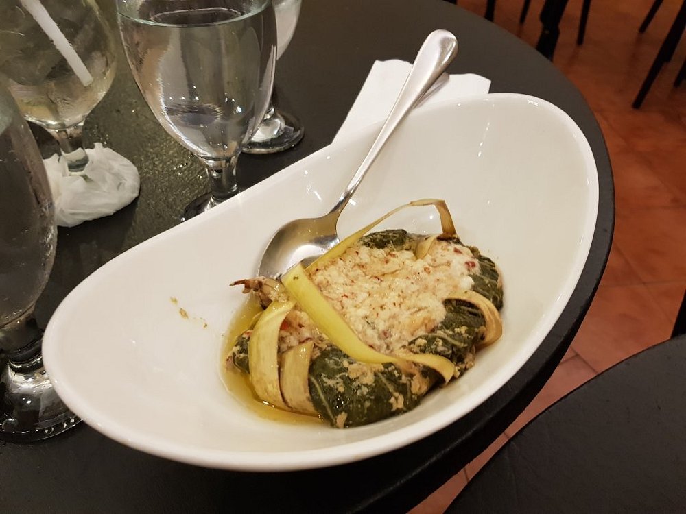 Pinangat served in a white bowl at Café Escudero
