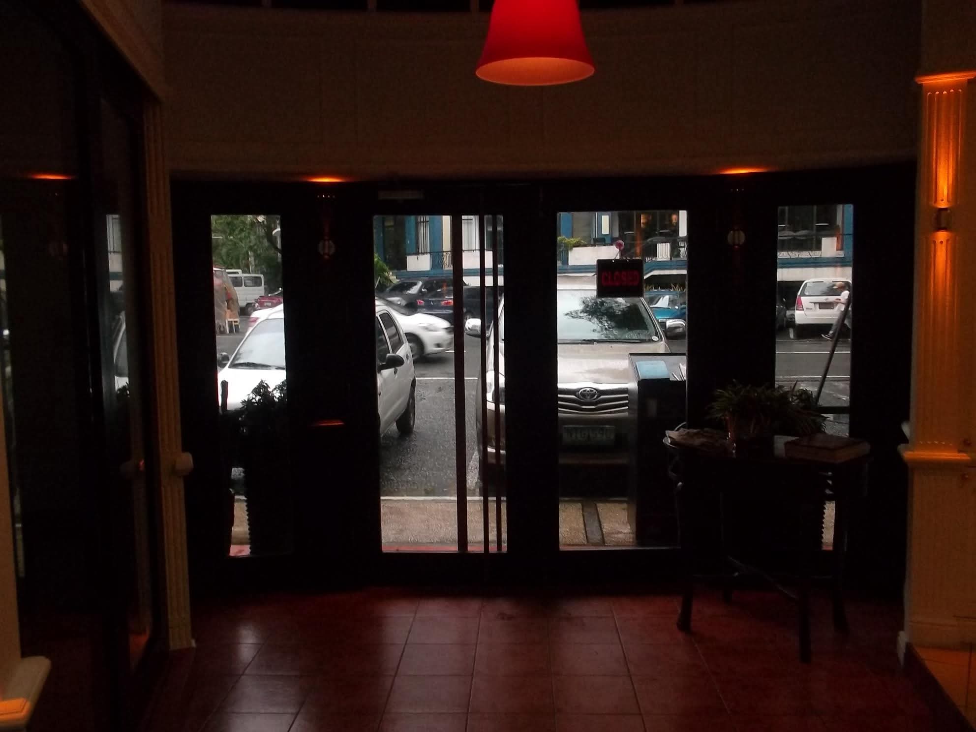Entrance doors from inside Café Escudero