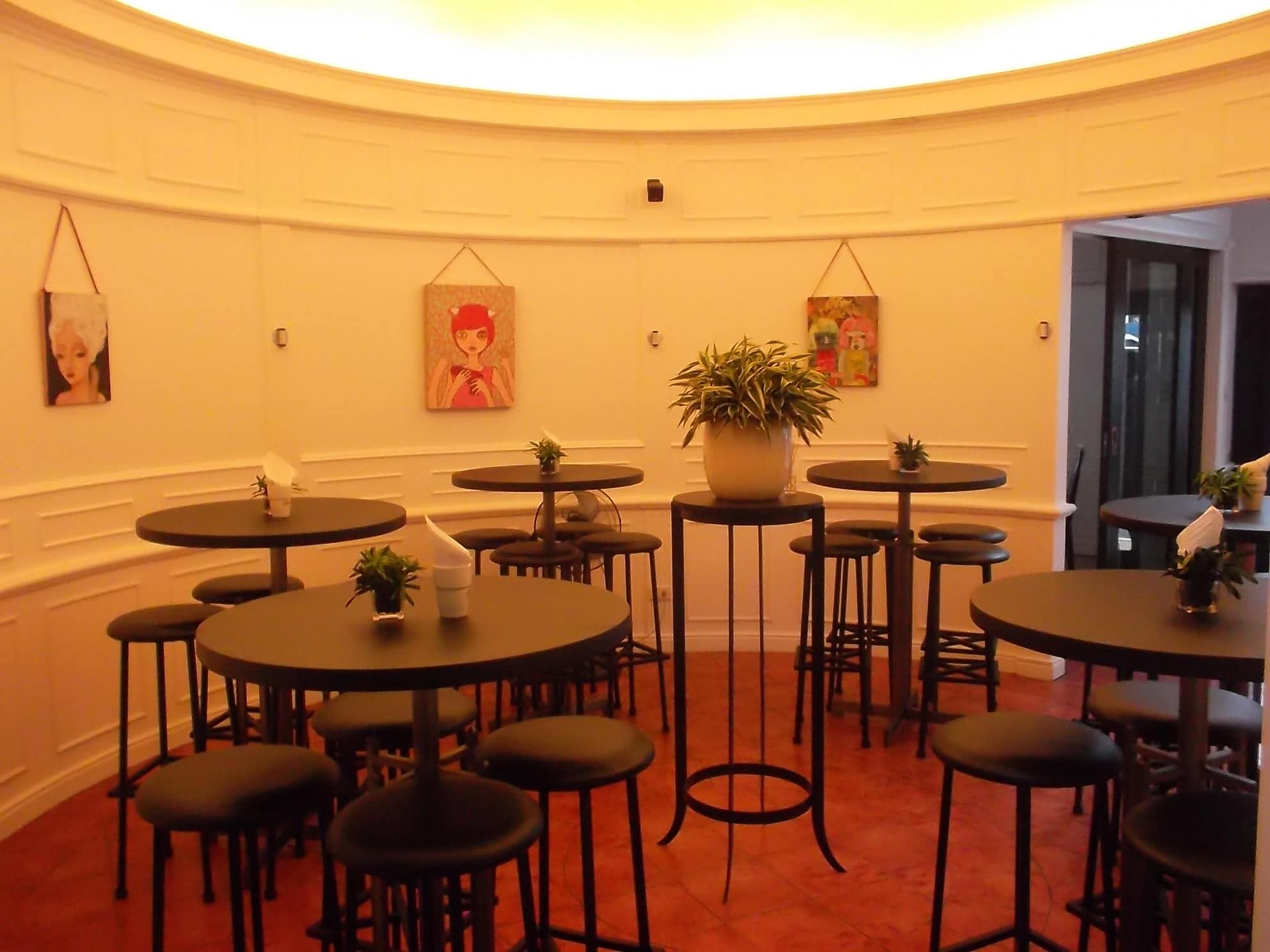 Warmly lit dining area at Café Escudero
