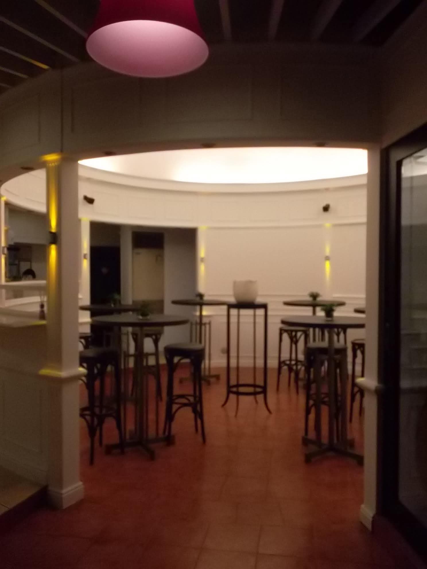 Dining area near the entrance of Café Escudero